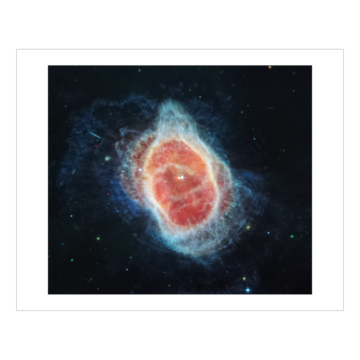 Planetary nebula known as the Southern Ring Nebula, ring of gas and dust with stars behind, taken with the MIRI camera..