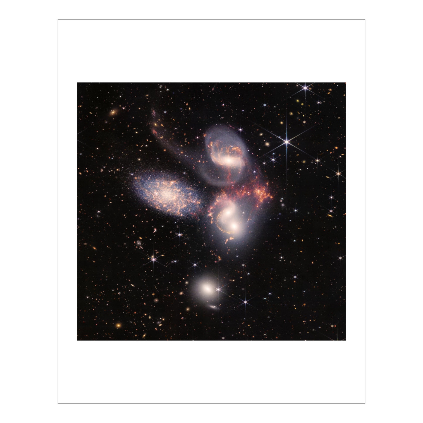 Stephan's Quintet composite image, 5 large nearby galaxies are shown, many further off in the distance.