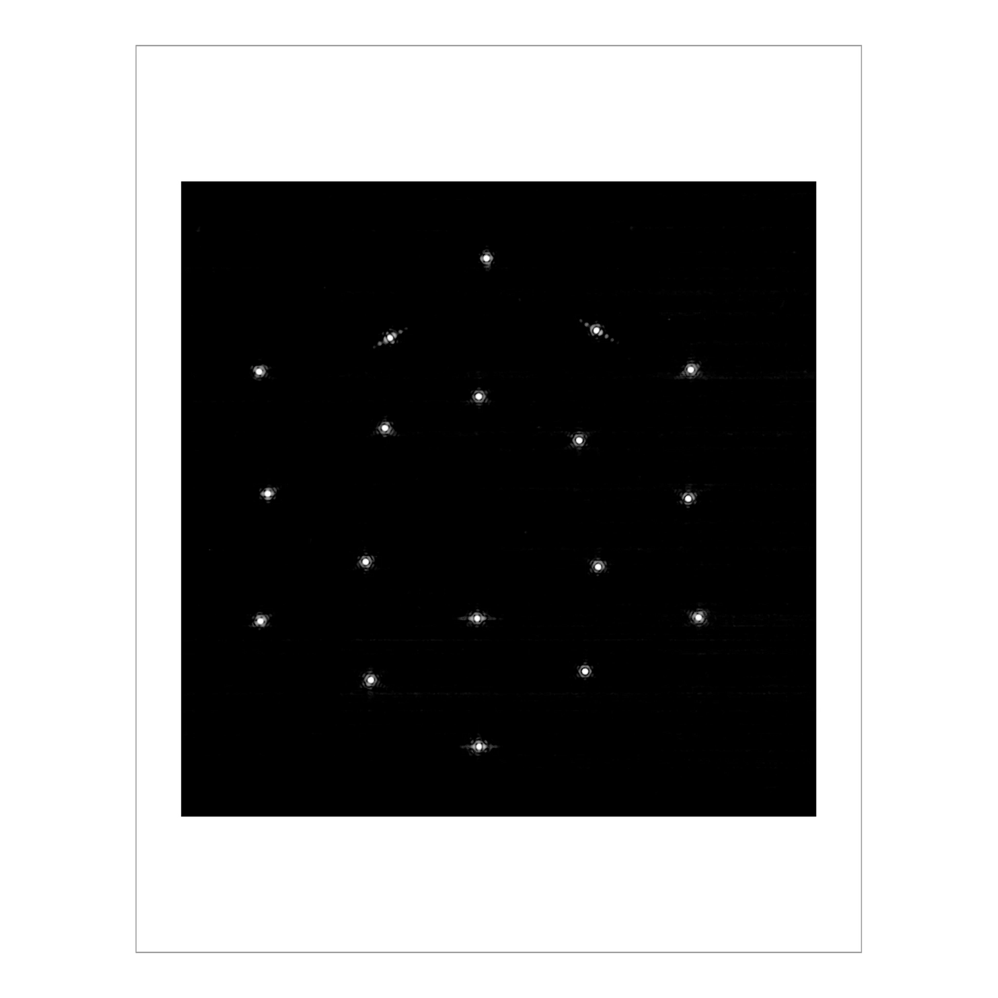 The same star repeated 18 times, once for each of the Webb’s mirrors, into a hexagonal formation.
