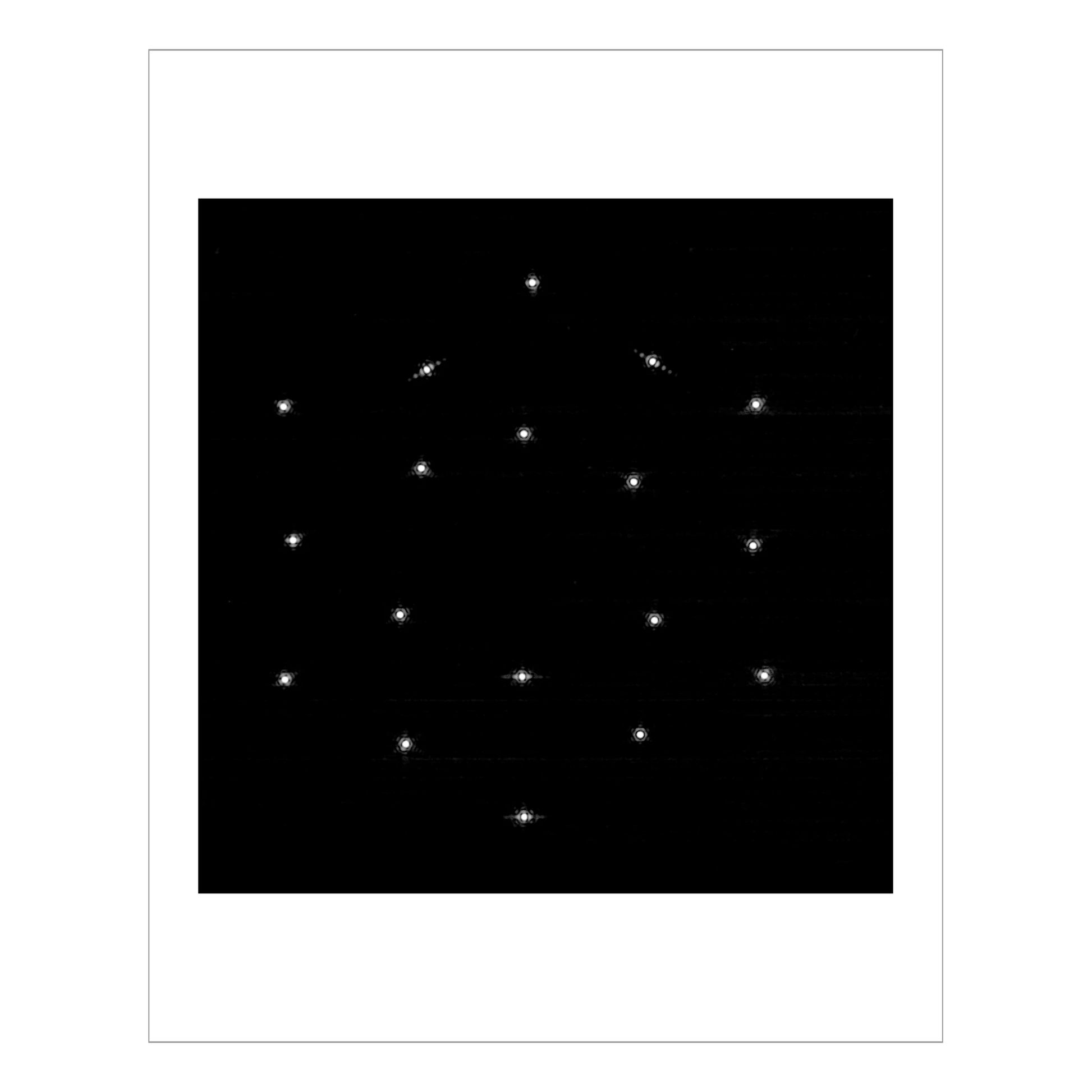 The same star repeated 18 times, once for each of the Webb’s mirrors, into a hexagonal formation.