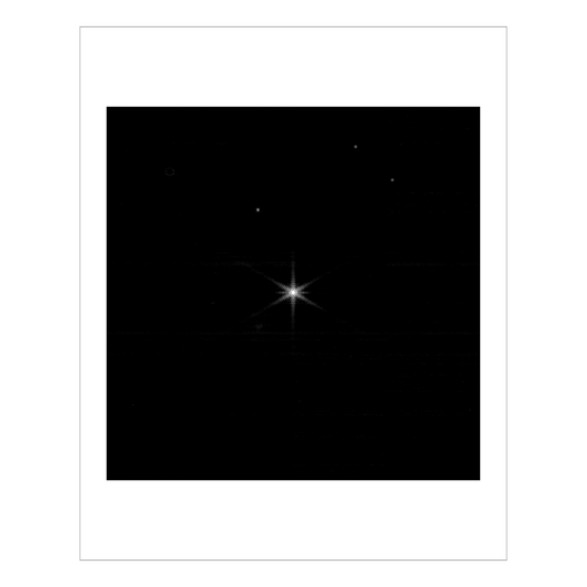 After alignment a single, now in focus, bright star is pictured centrally, and three smaller stars are in the distance.