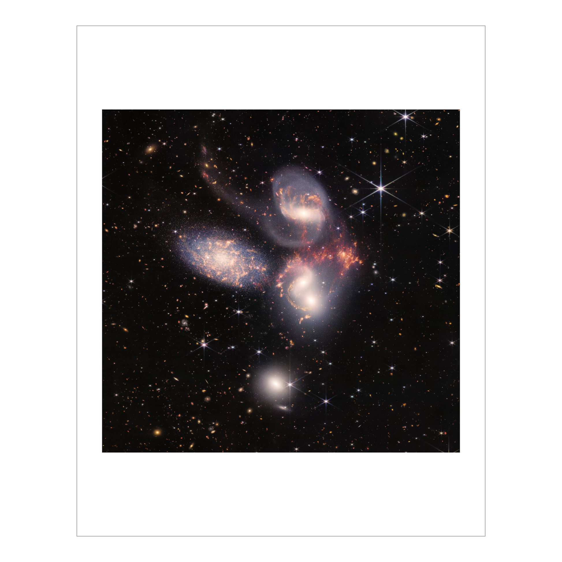 Stephan's Quintet composite image, 5 large nearby galaxies are shown, many further off in the distance.